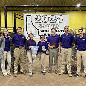 K-State crops judging team members standing and looking at camera