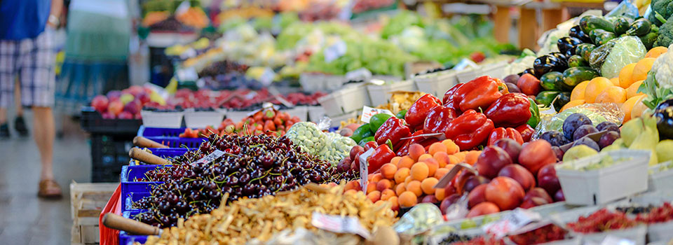 fruit and vegetables on display in a grocery storre