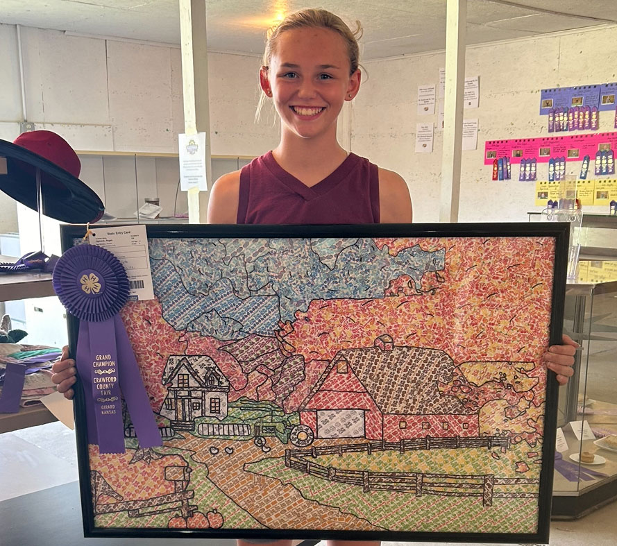 Young girl smiling and holding a picture frame of a farm scene Young girl smiling and holding a picture frame of a farm scene