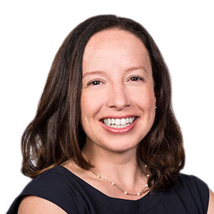 Portrait, Megin Nichols, woman with brown hair smililng at camera