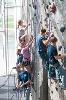 Teens from across Kansas take part in an indoor rock climbing session at the K-State Recreation Center during 2019 4-H Discovery Days. 