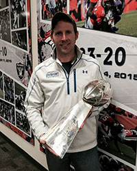 Billy Fogo, DVSports, holding Super Bowl trophy