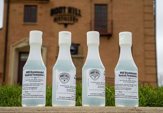 Four bottles of hand cleanser produced by Boot Hill Distillery, Dodge City