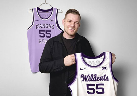 Man holding Kansas State Wildcat jersey, Jason Wright