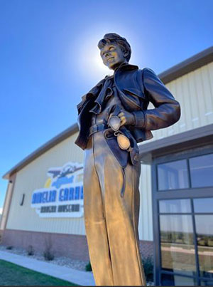 Statue of Amelia Earhart in front of museum in Atchison
