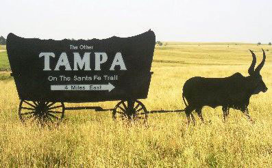 Steel sign, covered wagon welcome to Tampa, Kansas