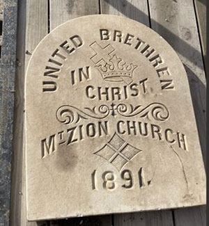 closeup, stone tablet with name of mount zion church