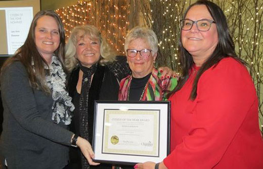 Four ladies posing for camera Four ladies posing for camera