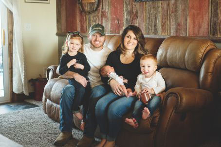 Family sitting on couch, Jake Farrant Family sitting on couch, Jake Farrant