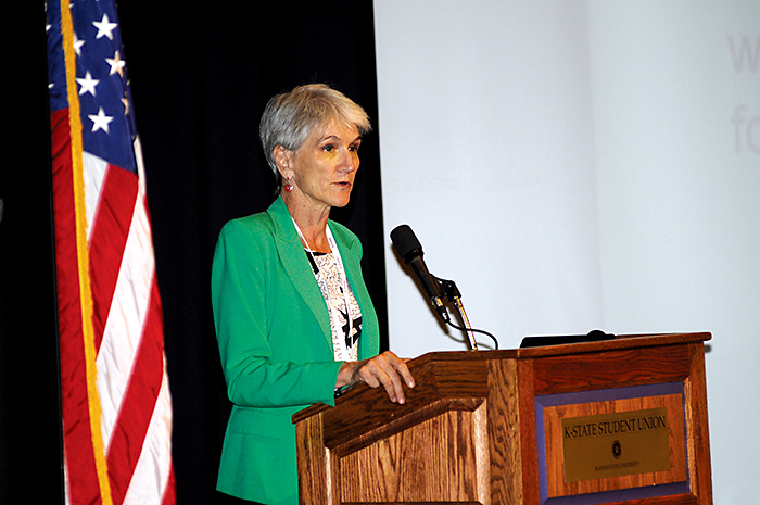 Woman standing at podium, Chessa Lutter Woman standing at podium, Chessa Lutter