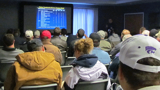 People sitting, cover your acres conference
