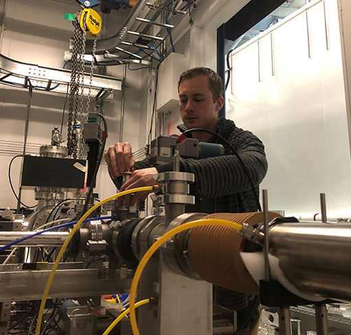 Man working with soil chemistry equipment