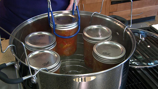 water bath canning, four jars in water