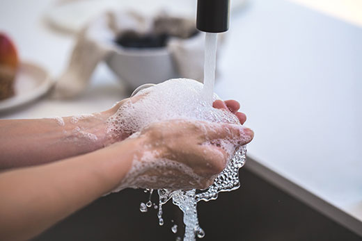 soapy hands washing in sink soapy hands washing in sink