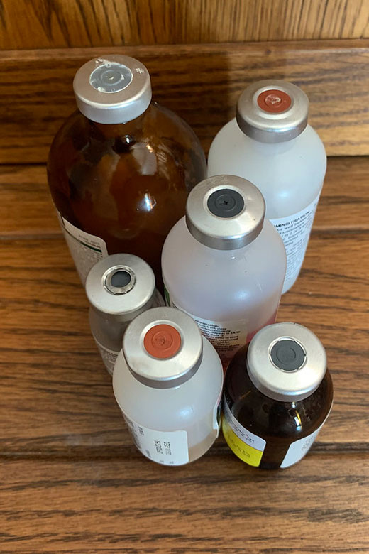 Top view of medicine bottles sitting on a table