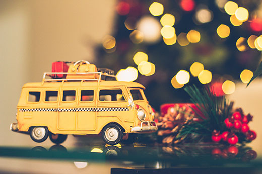 yellow school bus in front of christmas tree yellow school bus in front of christmas tree