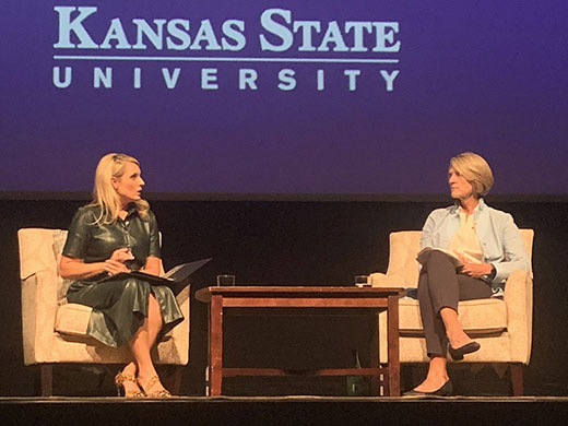 Tyne Morgan and Beth Ford, sitting in comfortable chairs on stage Tyne Morgan and Beth Ford, sitting in comfortable chairs on stage