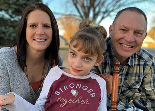Woman, man and small girl portrait, Jess and Laryce Schwieterman