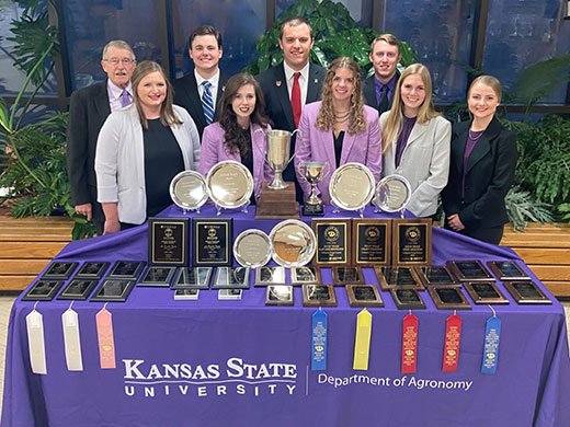 Team picture with awards, K-State Crops Team wins 2023 national title