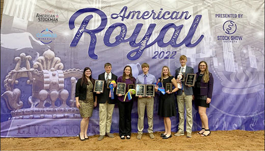 Group photo in front of American Royal banner, 4-H meat judging team Group photo in front of American Royal banner, 4-H meat judging team