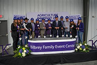 Twelve people holding shovels, Bilbrey Family Event Center groundbreaking